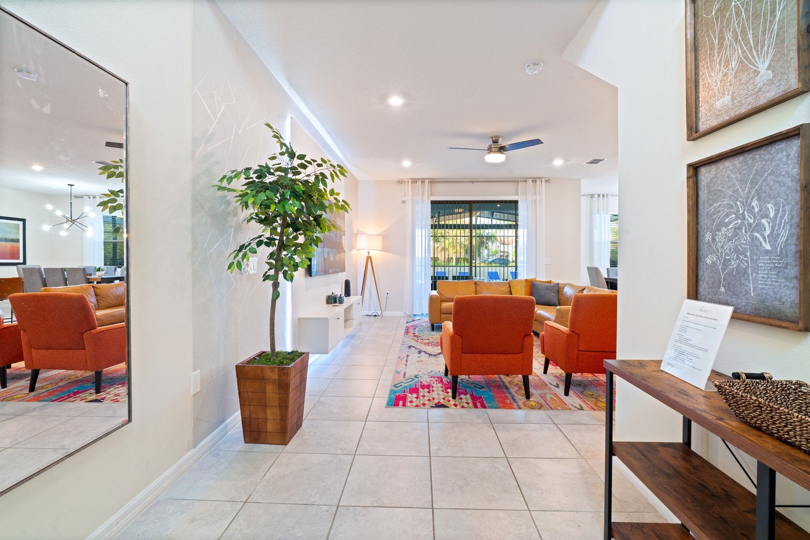 Welcoming entryway opening to a bright living area
