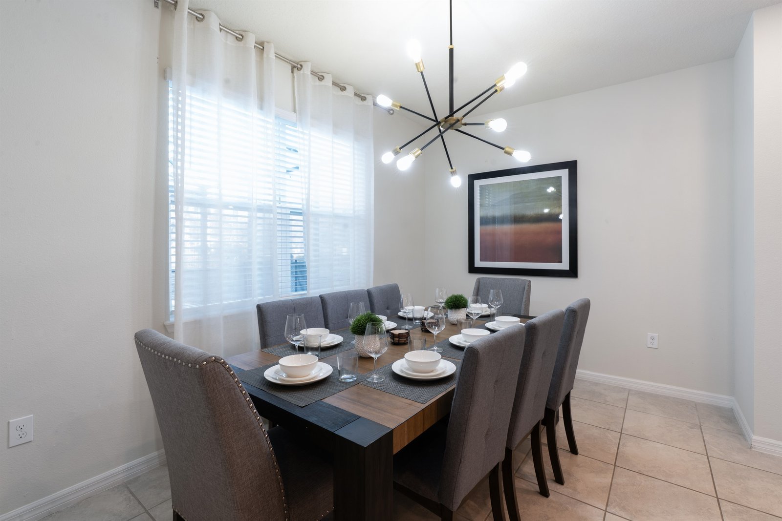 Elegant dining table seating 8 in a Florida villa near Disney