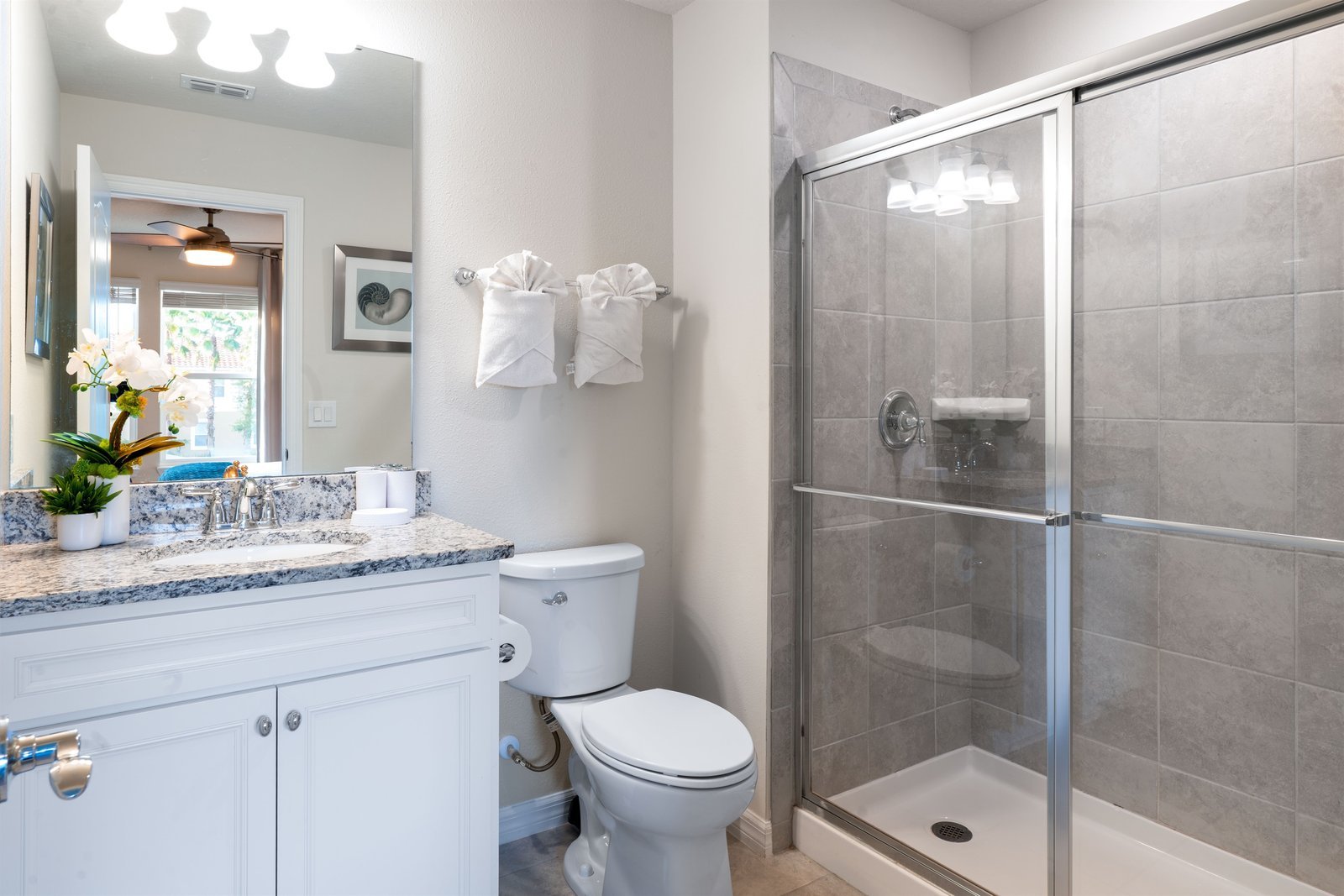 Sleek ensuite bathroom stocked with everyday essentials