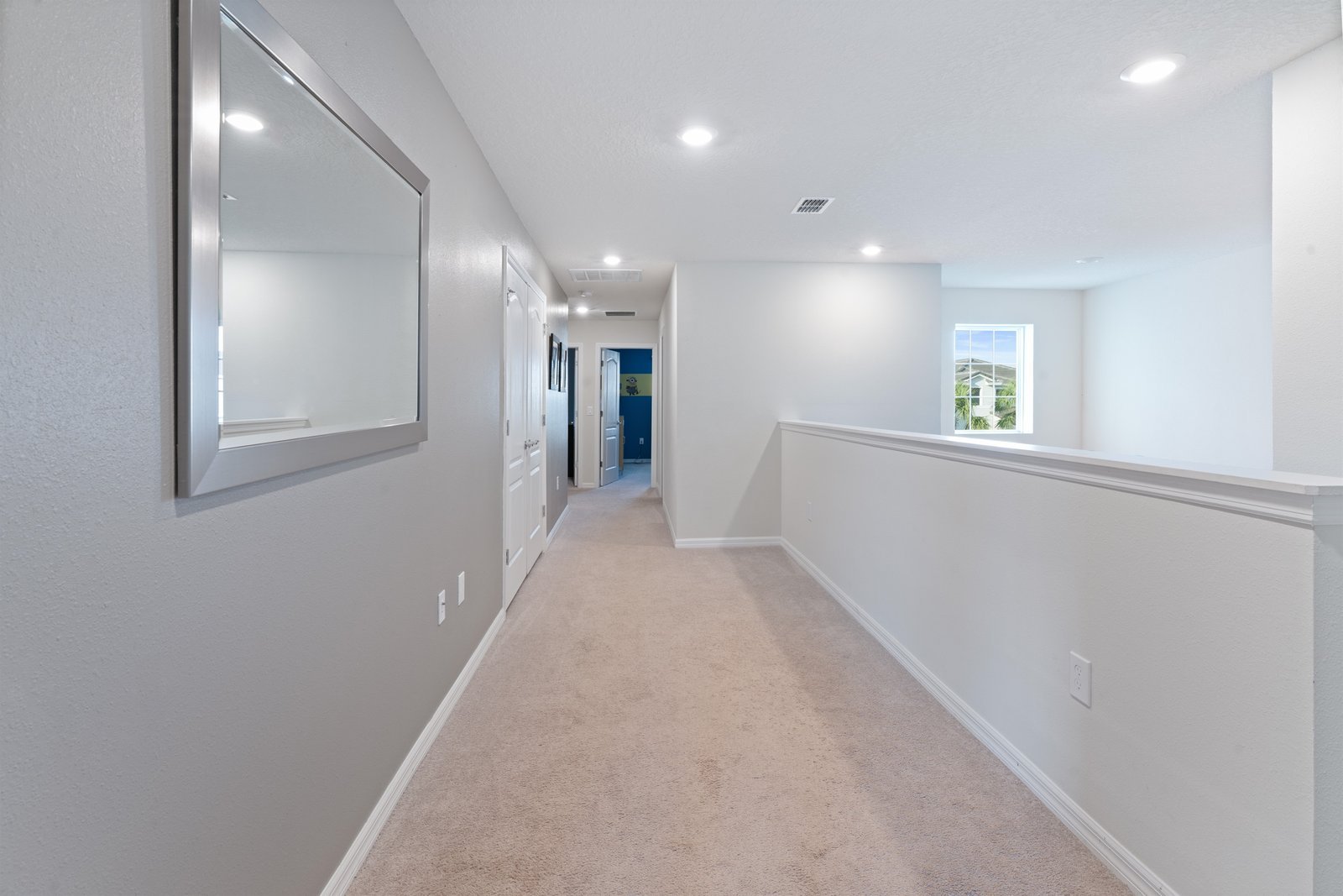 Upstairs hallway connecting kids rooms and master ensuites